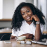 african-american-business-woman-with-computer-coffee